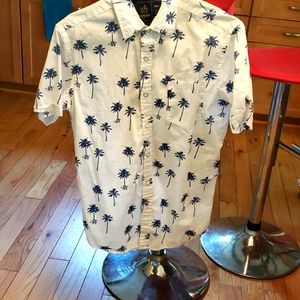 Mens short sleeve button down shirt with Navy Blue Palm Trees.